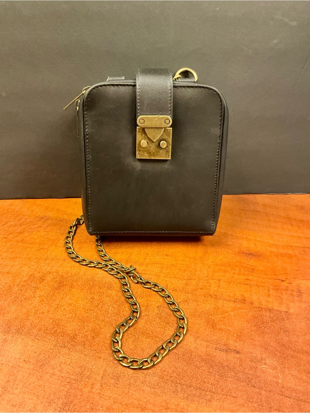 Structured Black Crossbody Bag with Gold Chain and Clasp